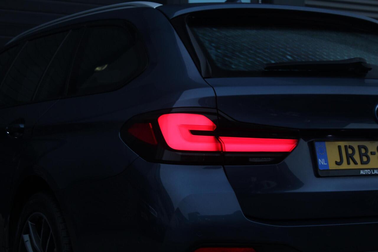 BMW 5-SERIE Touring 530e M-Sport | Stuur en Stoelverwarming | HUD | Elektrische stoelen | Sfeerverlichting