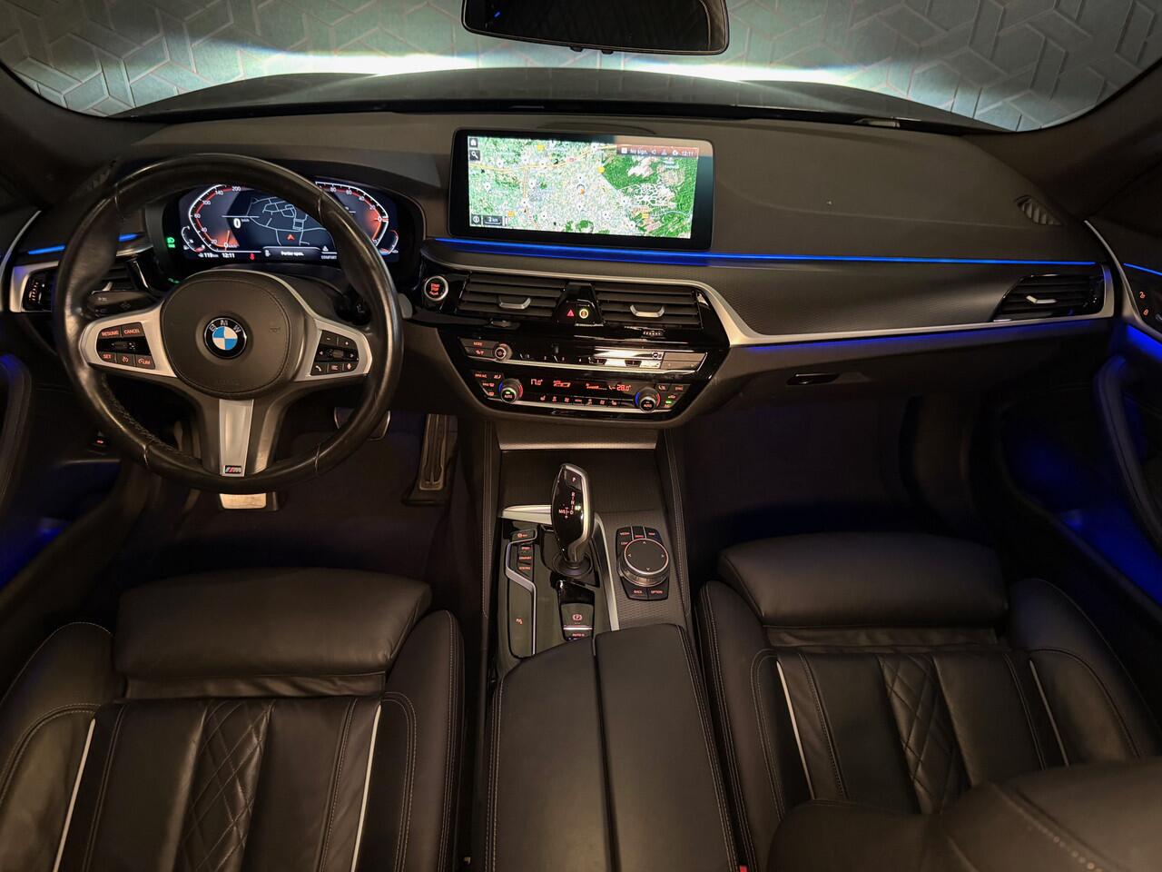 BMW 5-SERIE Touring 520i Business Ed | M-sport | Trekhaak | Tansanitblau