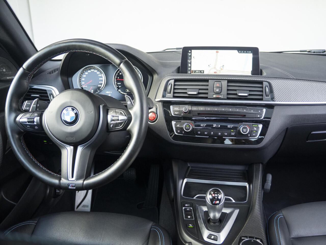 BMW M2 2 Serie Coupé Competition | M-Performance Carbon | 19'' | Comfort Access | Achteruitrijcamera | Schuif-/kanteldak | Stoelverwarming | Harman-Kardon | Remus Uitlaatsysteem