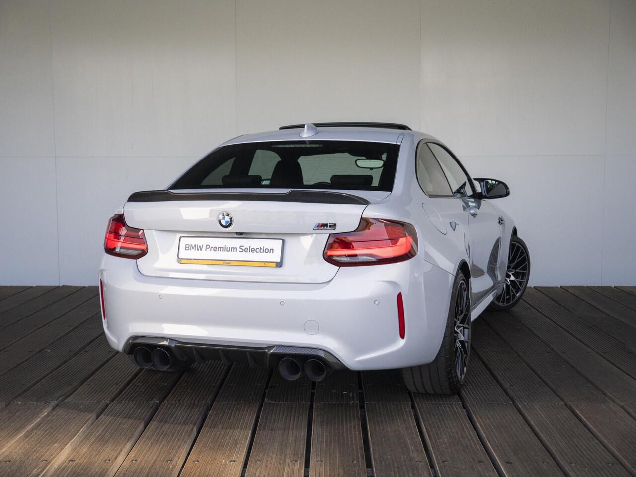 BMW M2 2 Serie Coupé Competition | M-Performance Carbon | 19'' | Comfort Access | Achteruitrijcamera | Schuif-/kanteldak | Stoelverwarming | Harman-Kardon | Remus Uitlaatsysteem