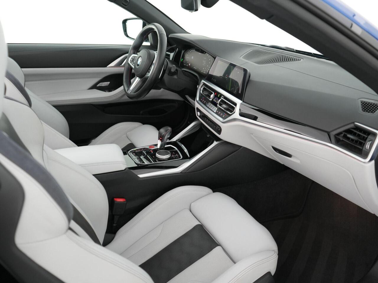 BMW M4 Competition Cabrio 510pk xDrive |dealer onderhouden|M-sport|M-sport stoelen|Laser LED|memory|360 camera|nekverwarming|sportuitlaat|HUD|blind spot|stoelventilatie + verwarming|