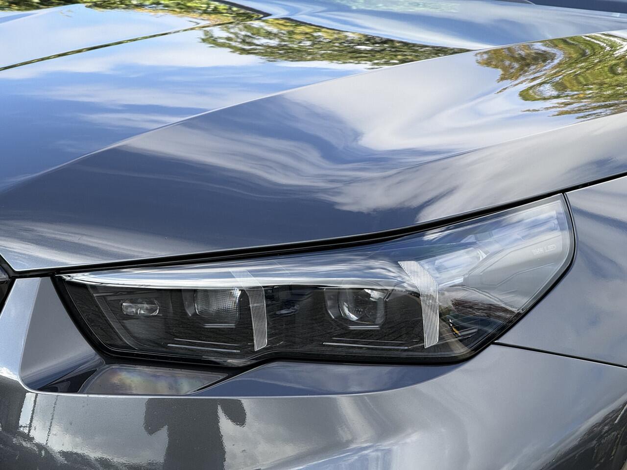 BMW M5 Touring | Panorama | Driving Ass. + | M Driver Pack | Trekhaak | Bowers & Wilkins | Iconic Glow | Carbon Interieurlijst