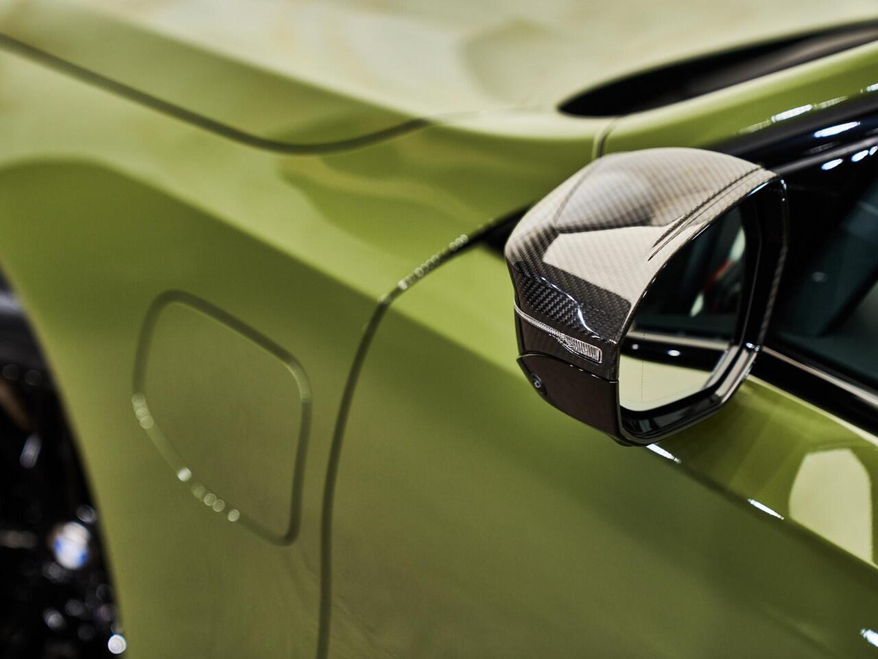 BMW M5 Touring V8 M Hybrid, Akrapovic, H&R, Sonderlackierung, pano, tr.haak, 21", alcantara, B&W, stl.ventilatie, memory, carbon, leder, keyless, privacy