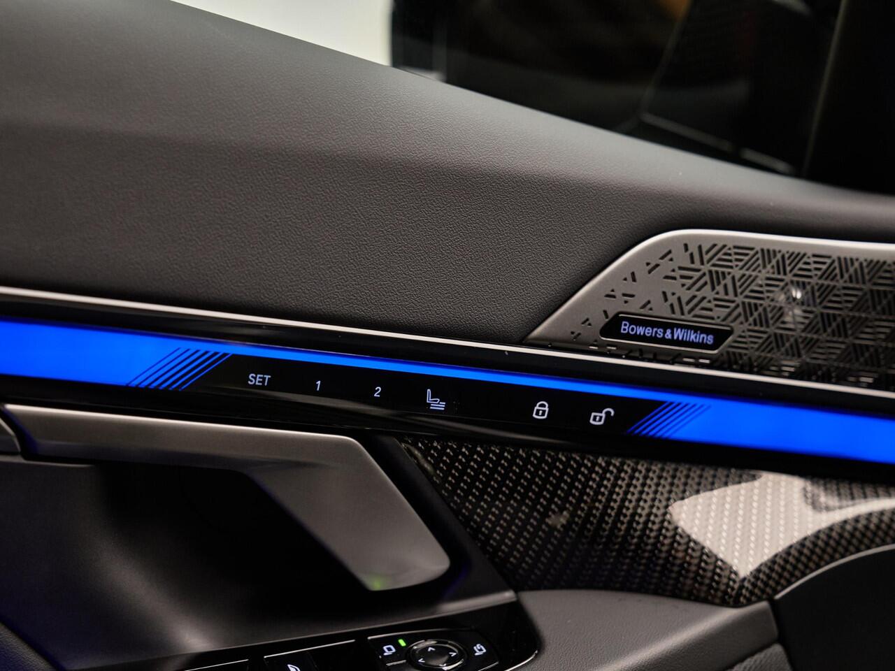 BMW M5 Touring V8 M Hybrid, Akrapovic, H&R, Sonderlackierung, pano, tr.haak, 21", alcantara, B&W, stl.ventilatie, memory, carbon, leder, keyless, privacy