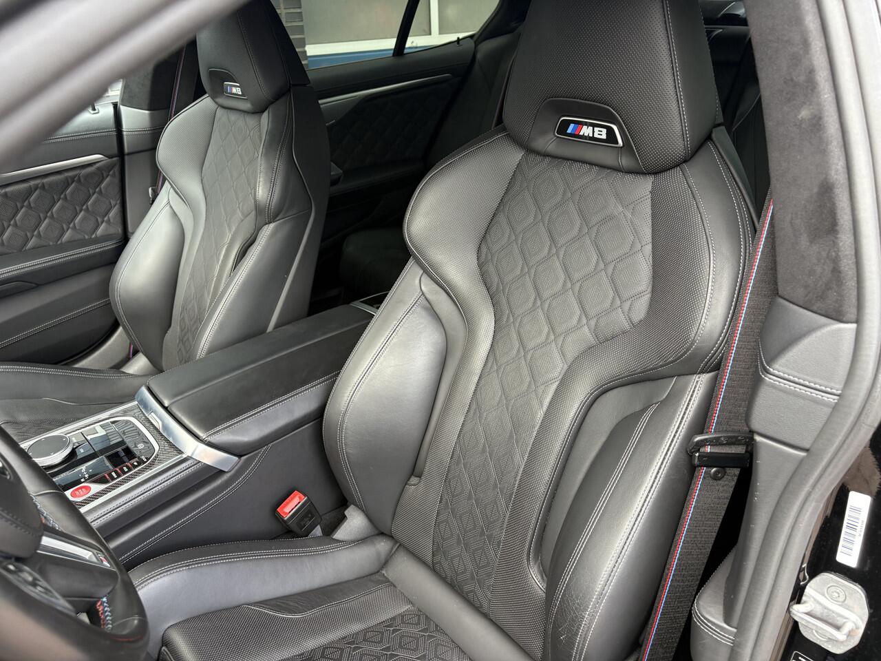 BMW M8 8-serie Gran Coupé Competition, all black.