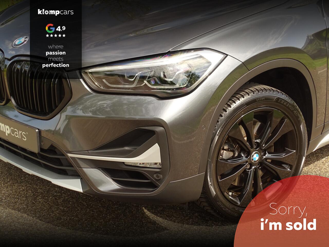 BMW X1 sDrive20i Executive | Camera | Nav | M-sportstuur | Zw.hemel | 18" | Uniek kmst.