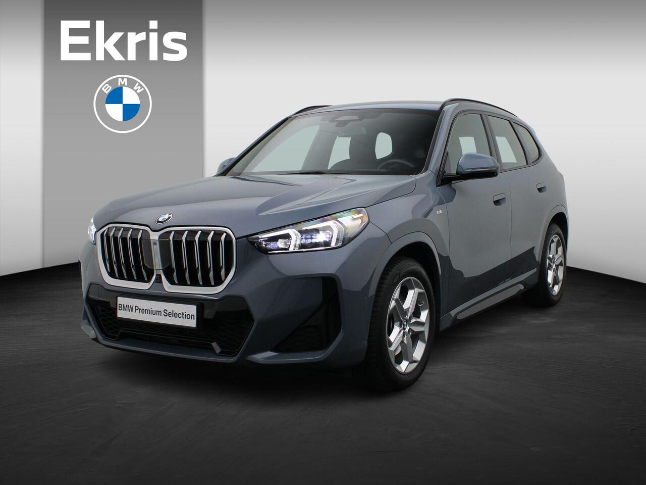 BMW X1 sDrive20i M Sportpakket | Innovation Pack | Comfort Pack | Adaptief M Onderstel | Trekhaak | Elektrisch Verstelbare Stoelen | Actieve Stoel Bestuurder | Driving Assistant Professional | Head-Up Display | Harman Kardon | 18''