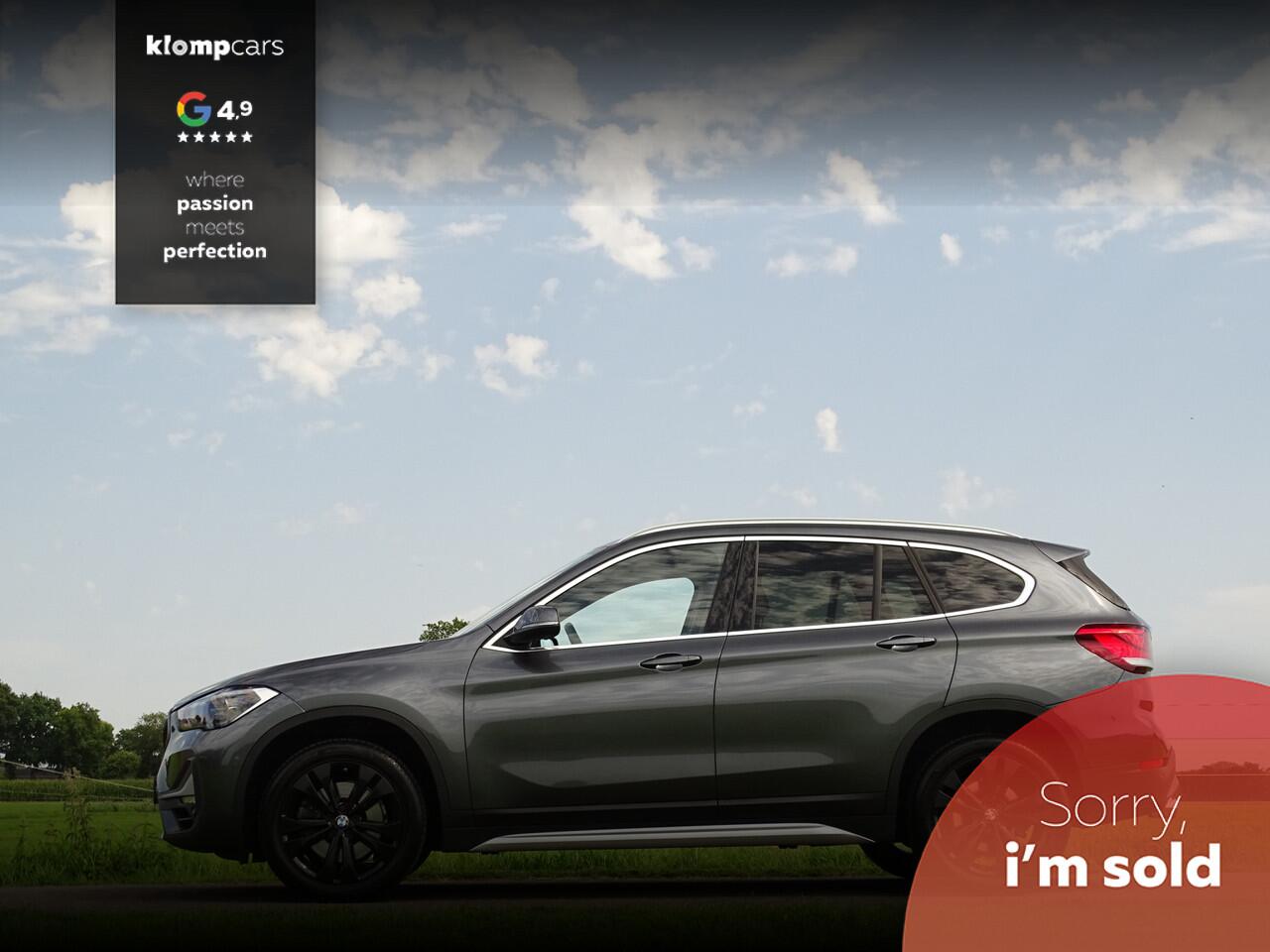 BMW X1 sDrive20i Executive | Camera | Nav | M-sportstuur | Zw.hemel | 18" | Uniek kmst.