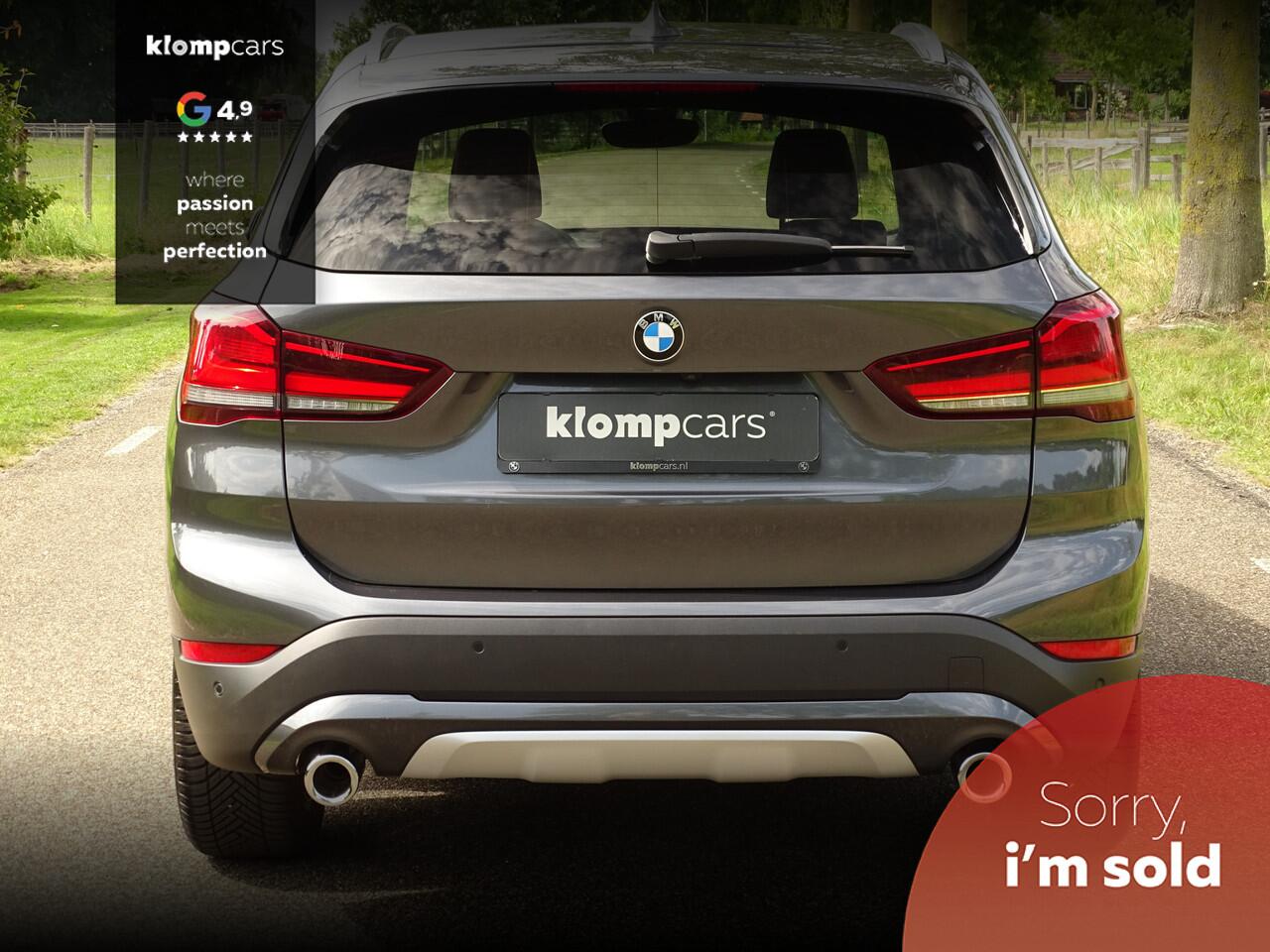 BMW X1 sDrive20i Executive | Camera | Nav | M-sportstuur | Zw.hemel | 18" | Uniek kmst.