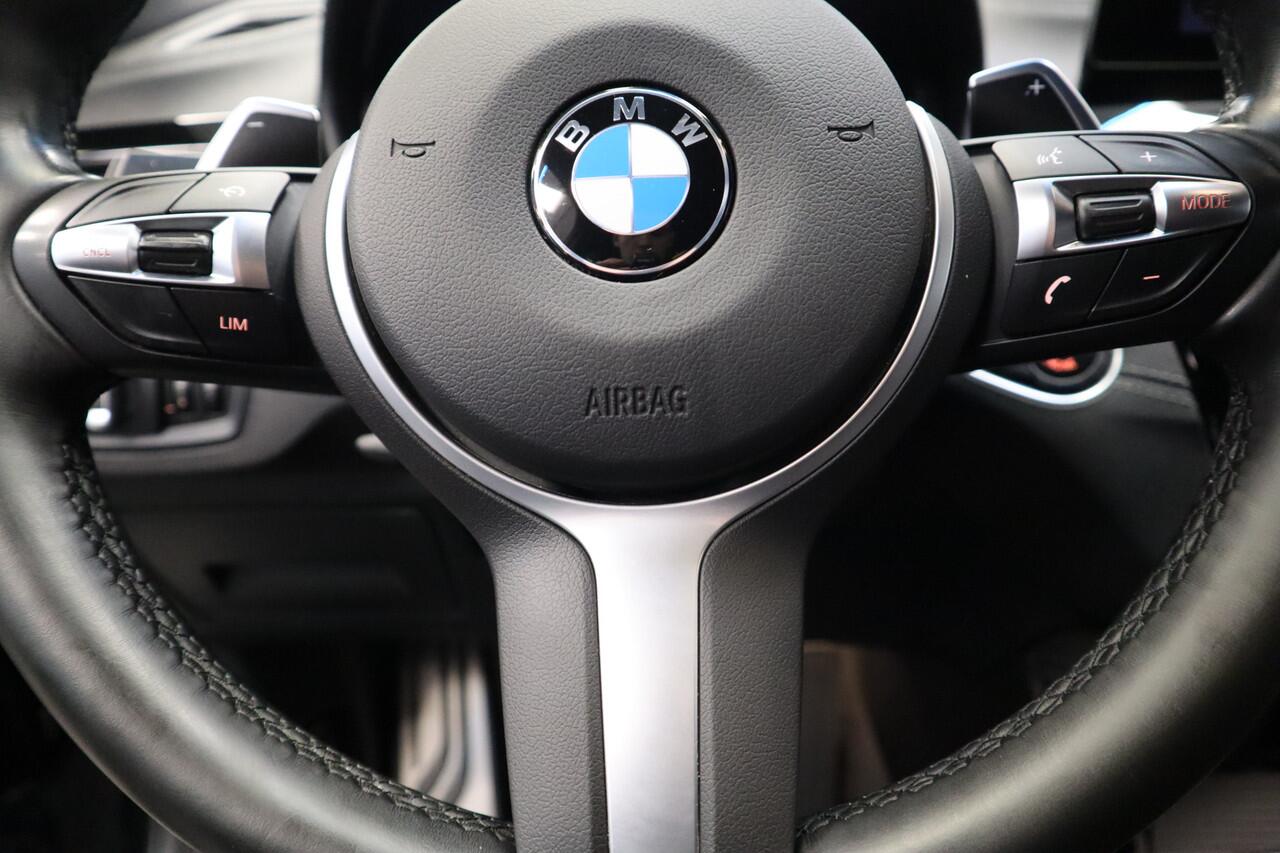 BMW X1 sDrive20i High Executive M-sport Panoramadak PDC Trekhaak NAP Head-Up 24 maanden garantie mogelijk (*vraag naar de voorwaarden)