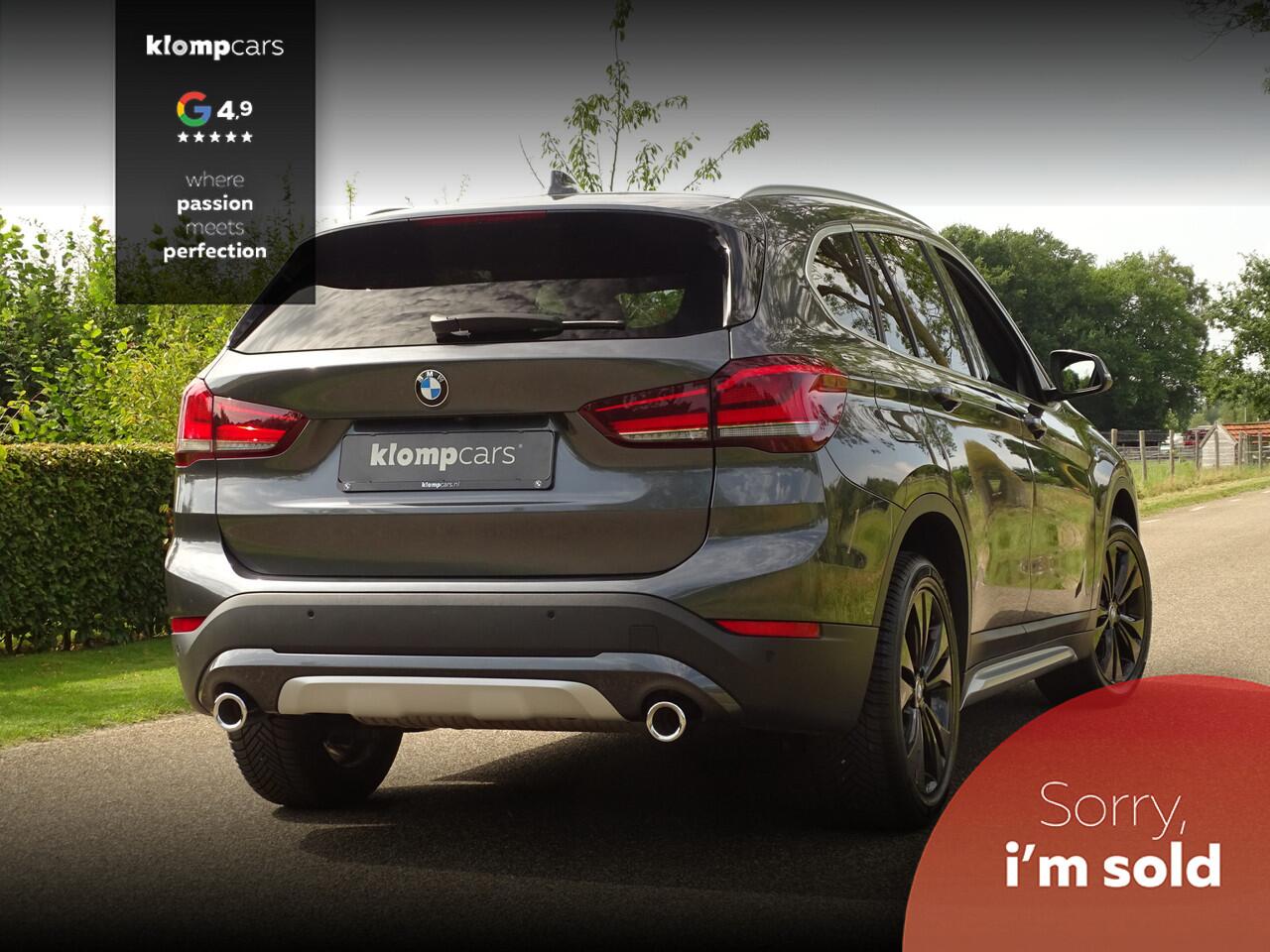 BMW X1 sDrive20i Executive | Camera | Nav | M-sportstuur | Zw.hemel | 18" | Uniek kmst.