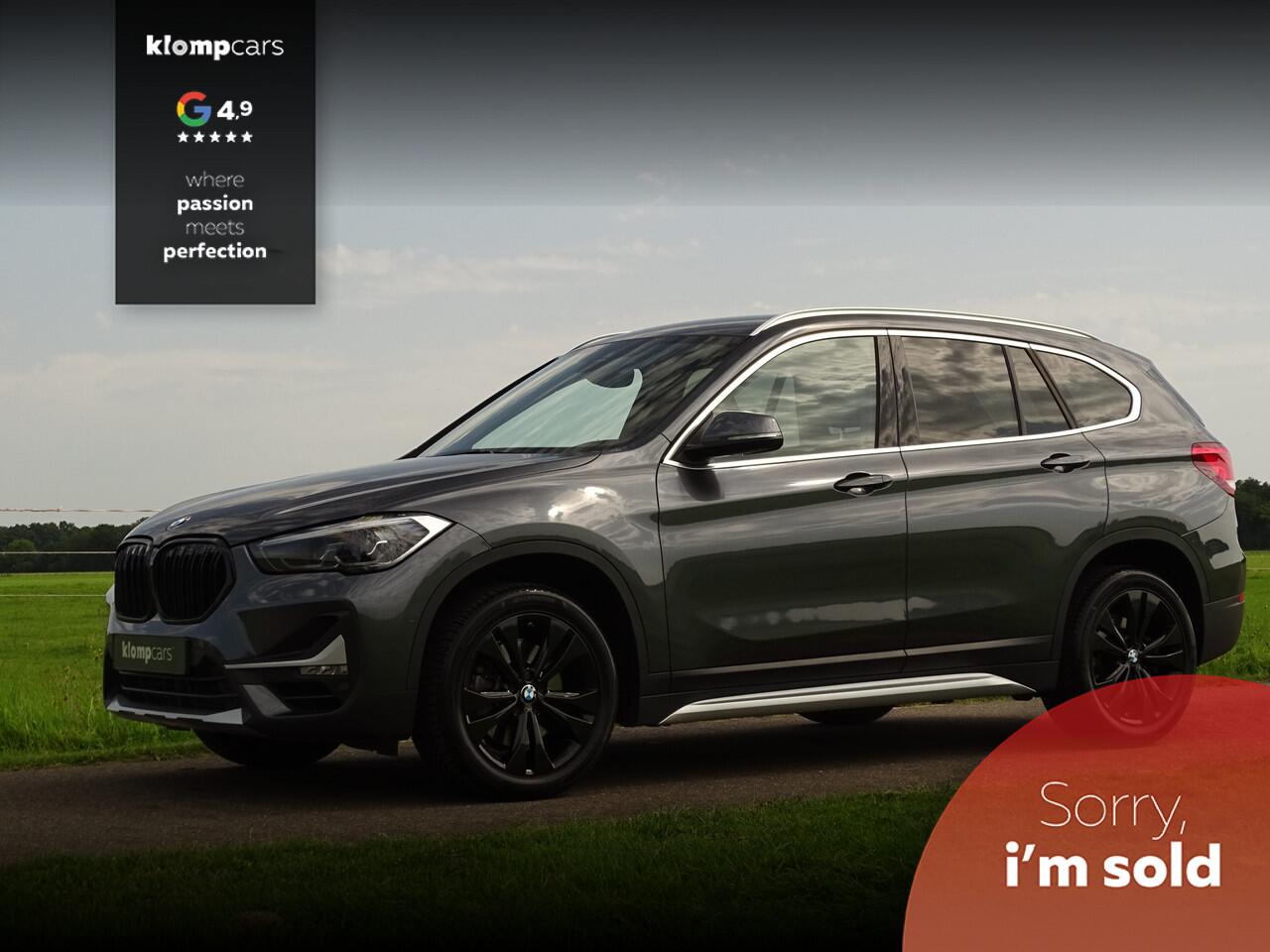 BMW X1 sDrive20i Executive | Camera | Nav | M-sportstuur | Zw.hemel | 18" | Uniek kmst.