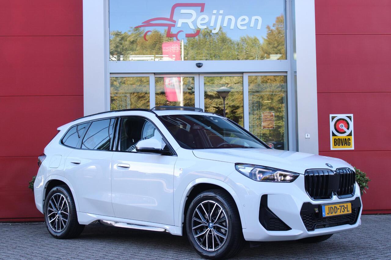 BMW X1 xDrive30e M-SPORT | PANORAMISCH SCHUIF/KANTEL DAK | ELEKTRISCH WEGKLAPBARE TREKHAAK | HARMAN/KARDON AUDIO SYSTEM | ALARMINSTALLATIE | ELEKTRISCH BEDIENBARE VOORSTOELEN MET GEHEUGENFUNCTIE "ACTIEVE ZITPLAATSEN" | STOEL VERWARMING | DRIVING ASSISTANT PROFES
