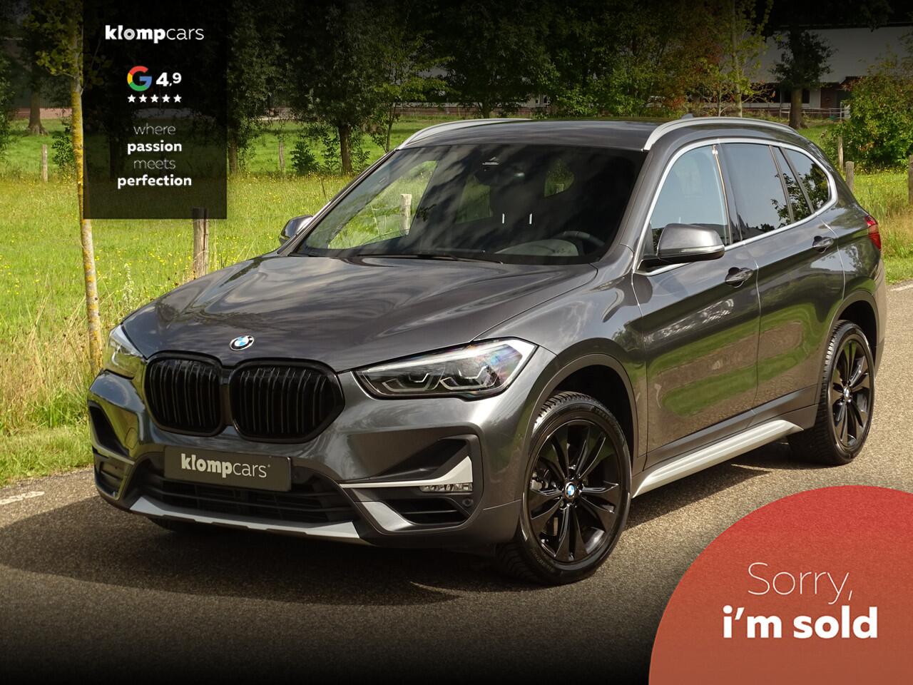 BMW X1 sDrive20i Executive | Camera | Nav | M-sportstuur | Zw.hemel | 18" | Uniek kmst.