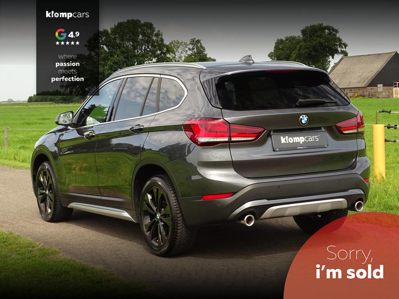 BMW X1 sDrive20i Executive | Camera | Nav | M-sportstuur | Zw.hemel | 18" | Uniek kmst.