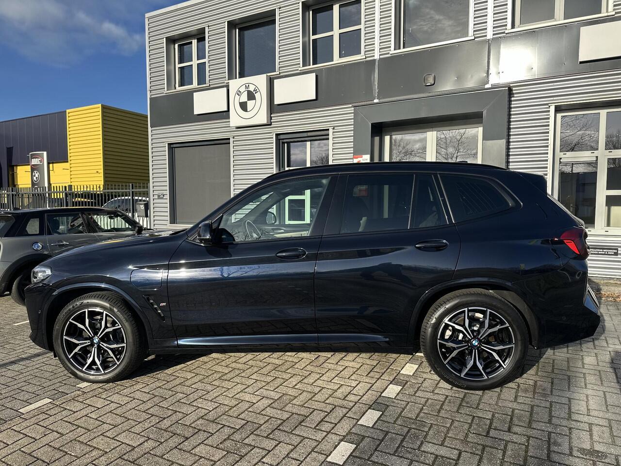 BMW X3 xDrive30e High Executive M-sport | Trekhaak | Surround view | Hifi