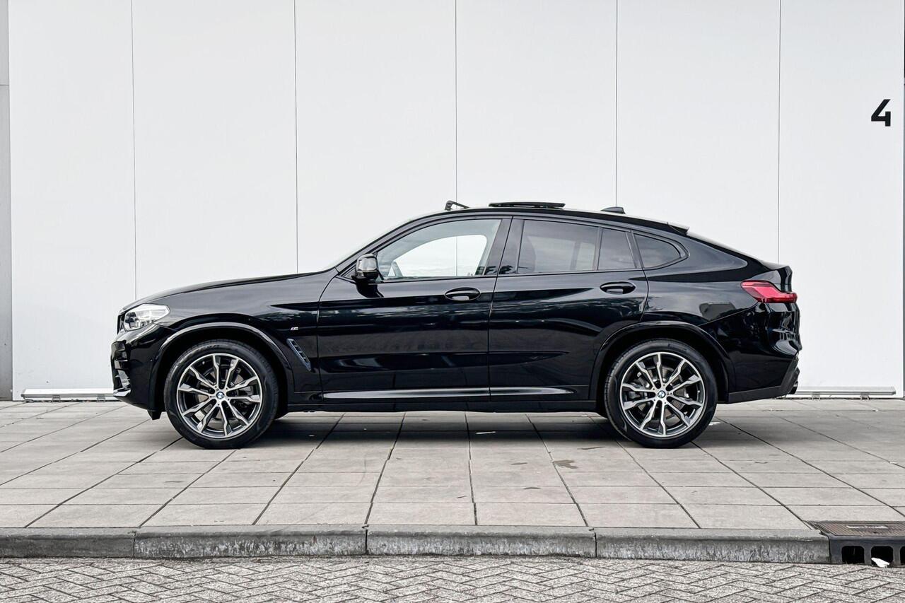 BMW X4 xDrive20i High Executive M-Sport Glazen Schuifdak / Electrisch verstelbare Voorstoelen / Head Up Display / Stoelverwarming / Electrische Zwenkhaak / Binnen & Buitenspiegel automatisch Dimmend / Adaptieve Led Koplampen / Driving Assistant / Hifi