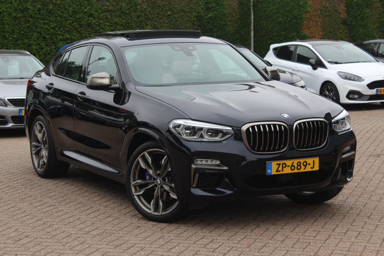 BMW X4 M40i High Executive / Trekhaak / Panoramadak / Camera / Head-up / Luxe Leder / 21'' / Harman Kardon / Navigatie / Stuur+Stoelverwarming / DAB / Dodehoek / Cruise Control