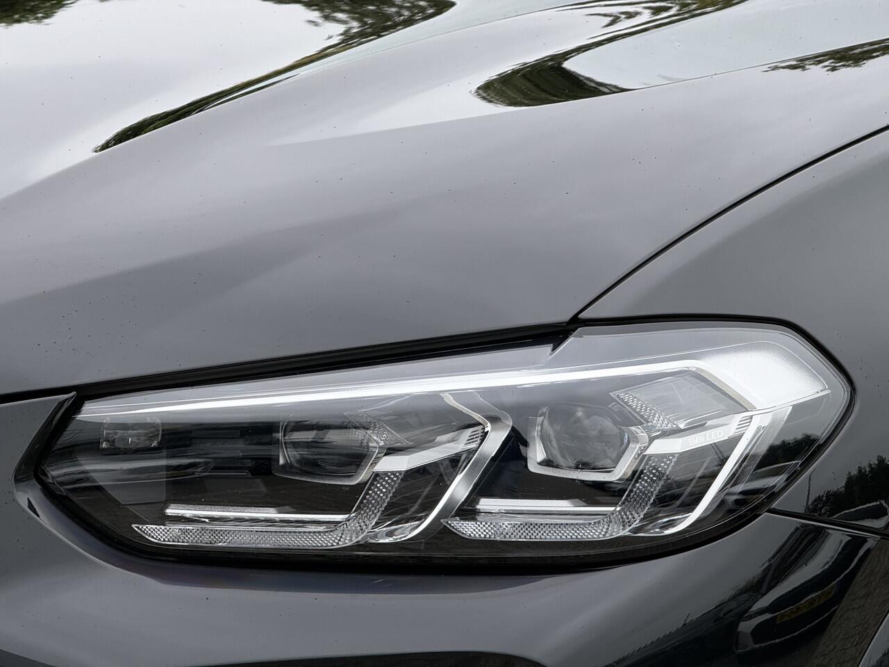 BMW X4 xDrive20i | M-Sport | 20'' | Panorama | Camera | Getint Glas