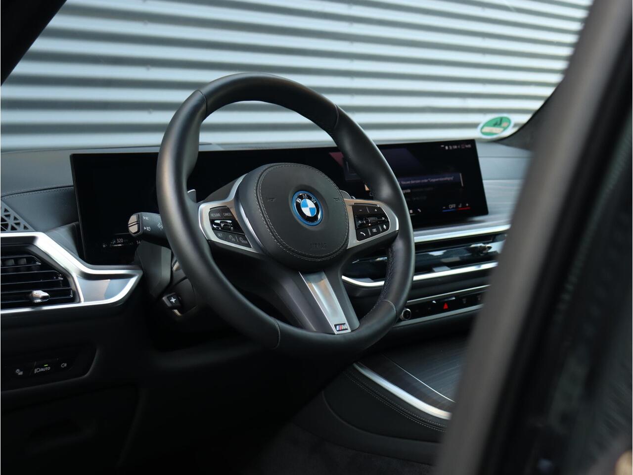 BMW X5 xDrive50e | M Sportpakket Pro | Panodak | Trekhaak | Driving Assistant Prof. | Parking Assistant Prof. | Harman Kardon | Stoelventilatie | Massage | Soft-Close | Active Steering | Head-Up | 22" LMV