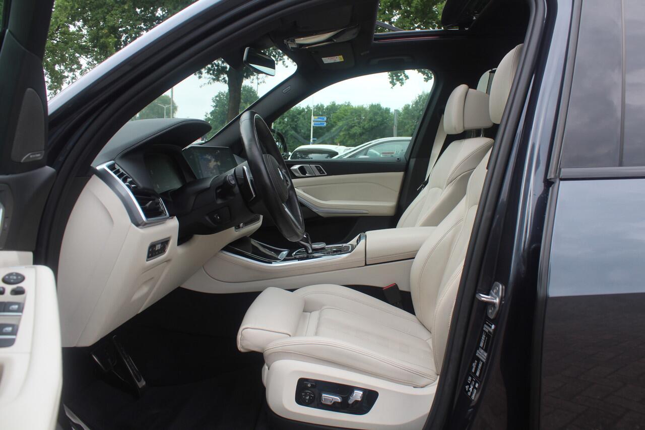BMW X5 xDrive30d High Exe. 7p. M Sport / Trekhaak / Panoramadak / Camera / Head-up / Softclose / 20'' / Harman Kardon / Luchtvering / Laser LED / Keyless / Leder / Apple CarPlay / Stuurverwarming / DAB / ACC / Zonnescherm zijruite
