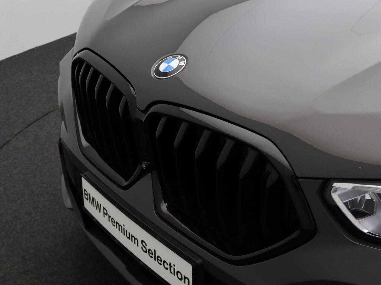 BMW X6 xDrive40i High Executive | M Sportpakket | Trekhaak | Glazen panoramadak Sky Lounge | Comfortstoelen | Head-Up Display | 22"