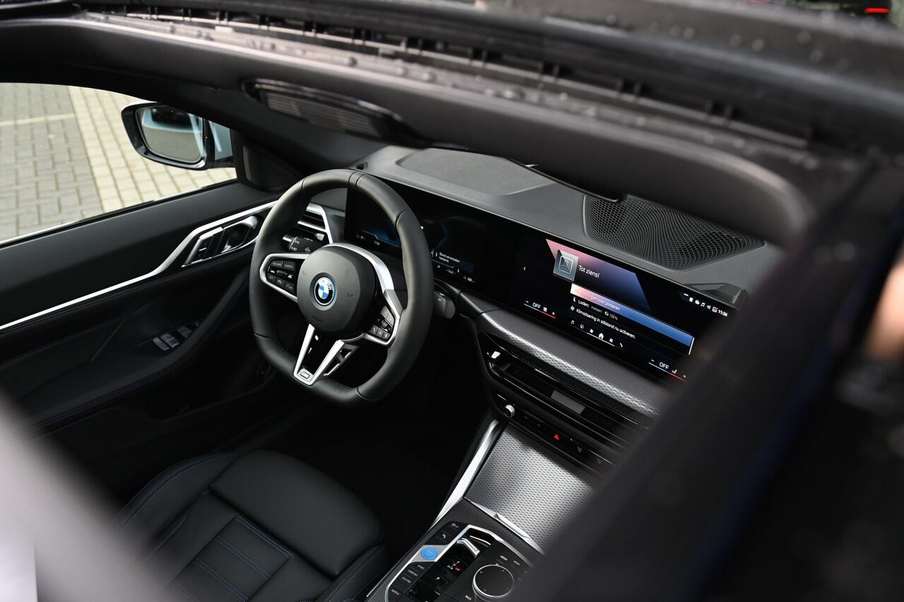 BMW i4 eDrive40 Gran Coupé M Sport / Schuif-kanteldak / Achteruitrijcamera / Comfort Access / Adaptieve LED / Active Cruise Control / Stuurverwarming