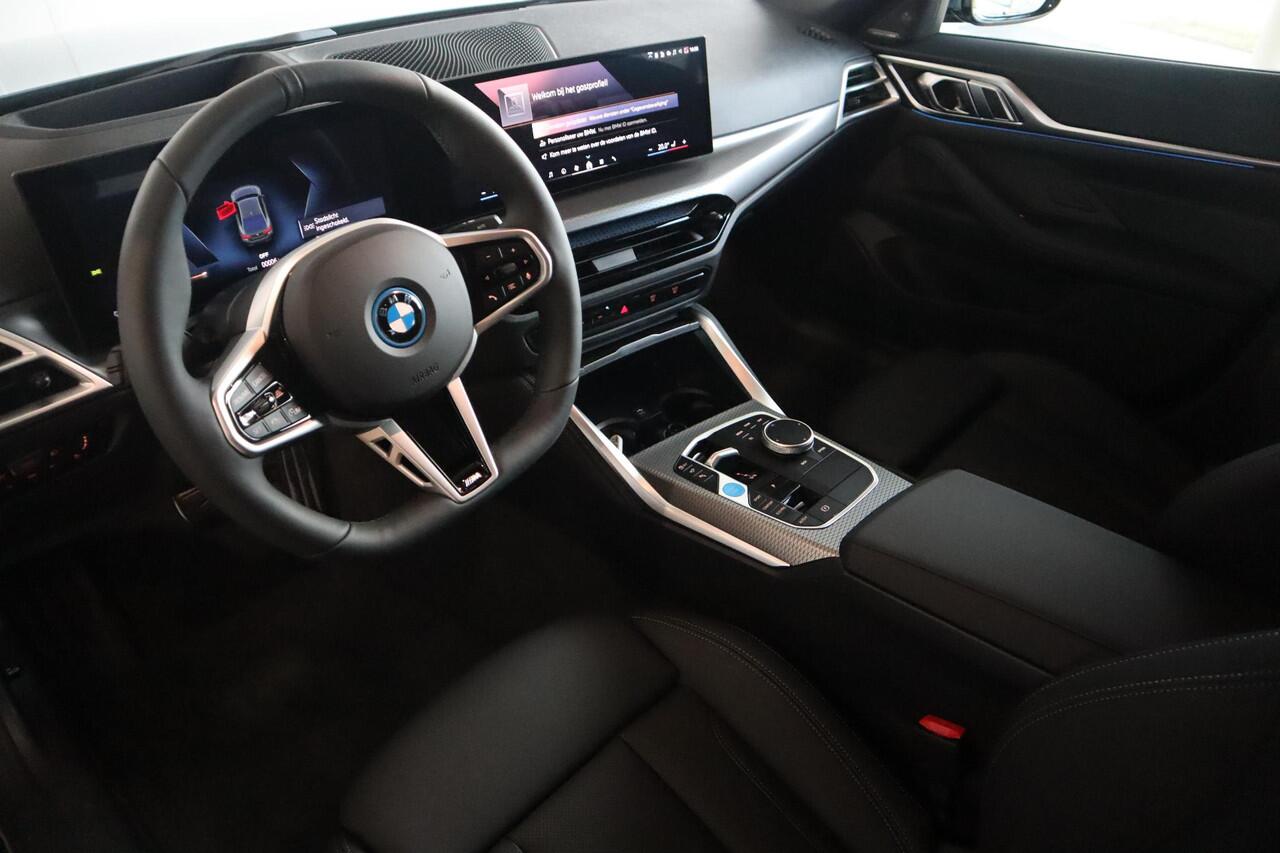 BMW i4 eDrive35 M Sportpakket | Stuur- en stoelverwarming | Active Cruise Control | Harman Kardon | Innovation Pack | Comfort Pack | Ekris Selection