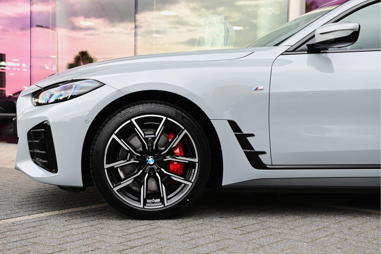 BMW i4 eDrive40 Gran Coupé M Sport / Schuif-kanteldak / Achteruitrijcamera / Comfort Access / Adaptieve LED / Active Cruise Control / Stuurverwarming