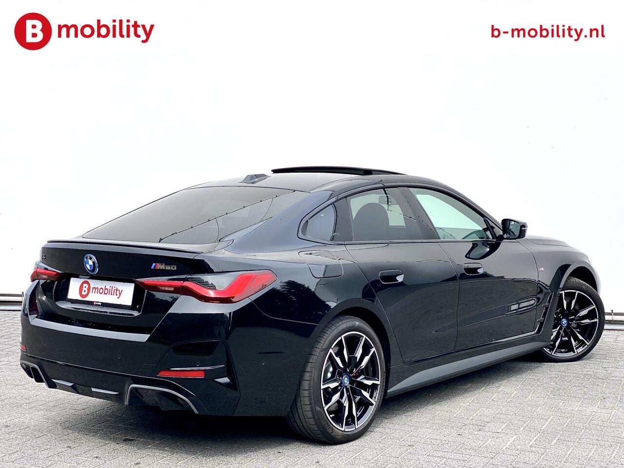 BMW i4 M50 544Pk High Executive 84 kWh Elektrisch verstelbare stoelen | Trekhaak 1600kg | Schuif/Kanteldak | Driving Assistant Professional | Harman Kardon Sound System | Head Up Display | Verwarmbaar stuurwiel | Interieurlijsten Carbon Fibre | Parking Assist.