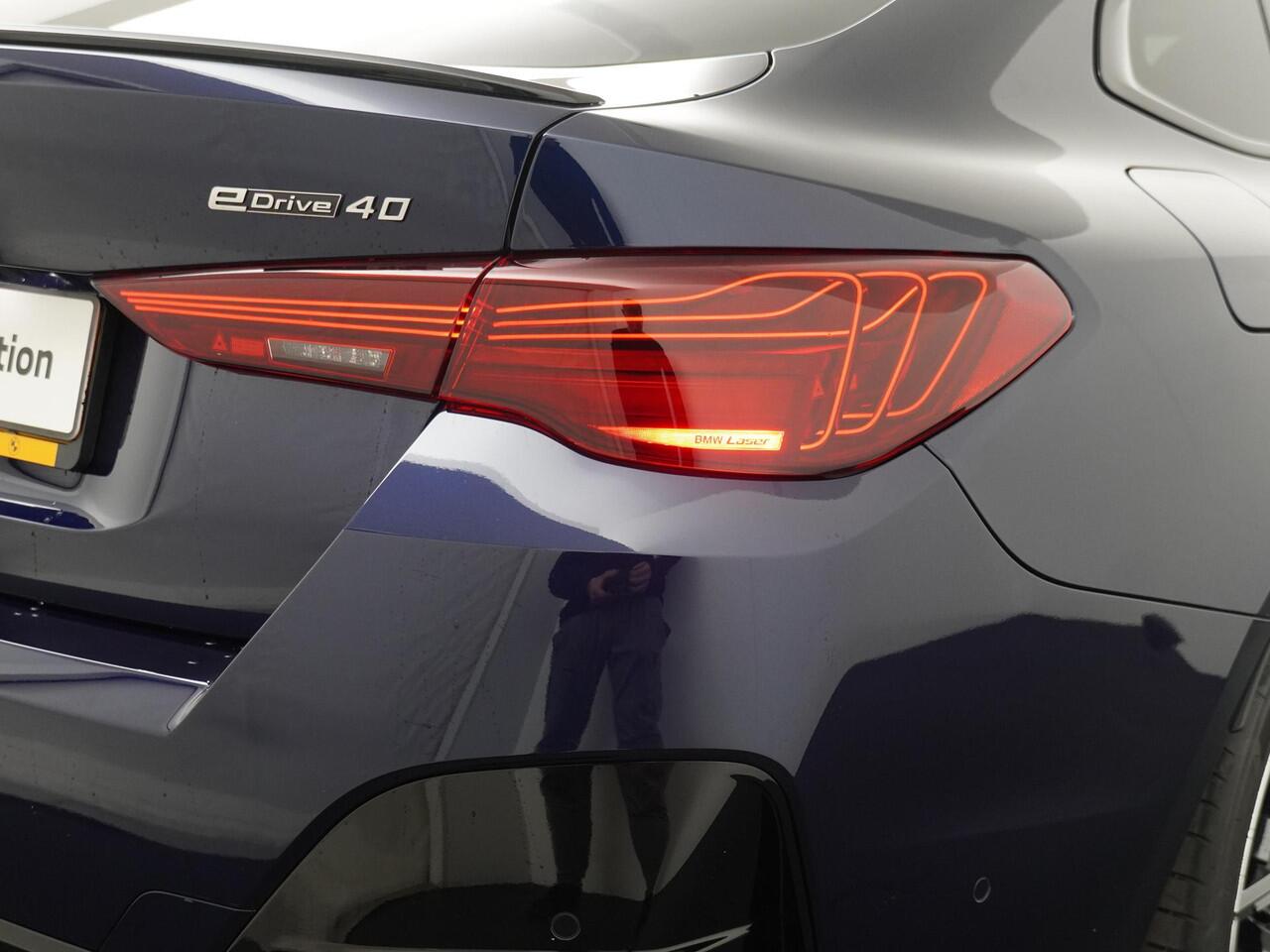 BMW i4 eDrive40 84 kWh M-Sport Pro | Trakhaak | Adaptive Cruise | HiFi | Comfort Access |