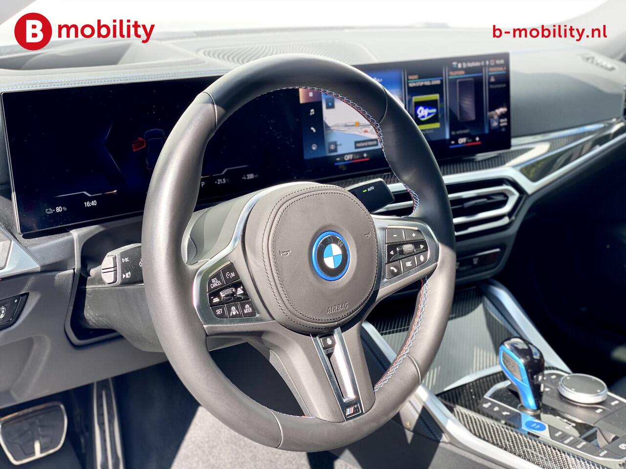 BMW i4 M50 544Pk High Executive 84 kWh Elektrisch verstelbare stoelen | Trekhaak 1600kg | Schuif/Kanteldak | Driving Assistant Professional | Harman Kardon Sound System | Head Up Display | Verwarmbaar stuurwiel | Interieurlijsten Carbon Fibre | Parking Assist.