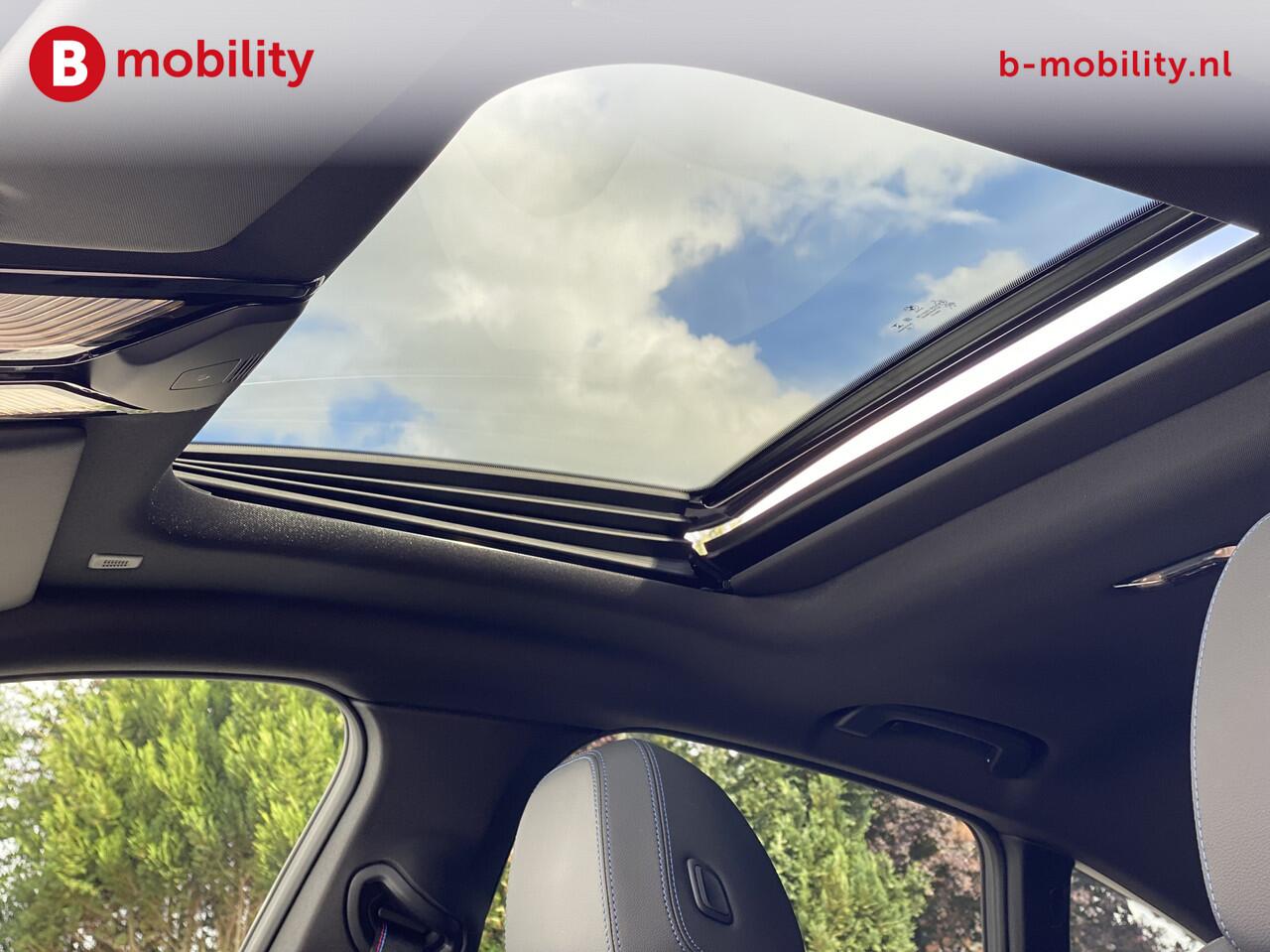 BMW i4 M50 544Pk High Executive 84 kWh Elektrisch verstelbare stoelen | Trekhaak 1600kg | Schuif/Kanteldak | Driving Assistant Professional | Harman Kardon Sound System | Head Up Display | Verwarmbaar stuurwiel | Interieurlijsten Carbon Fibre | Parking Assist.