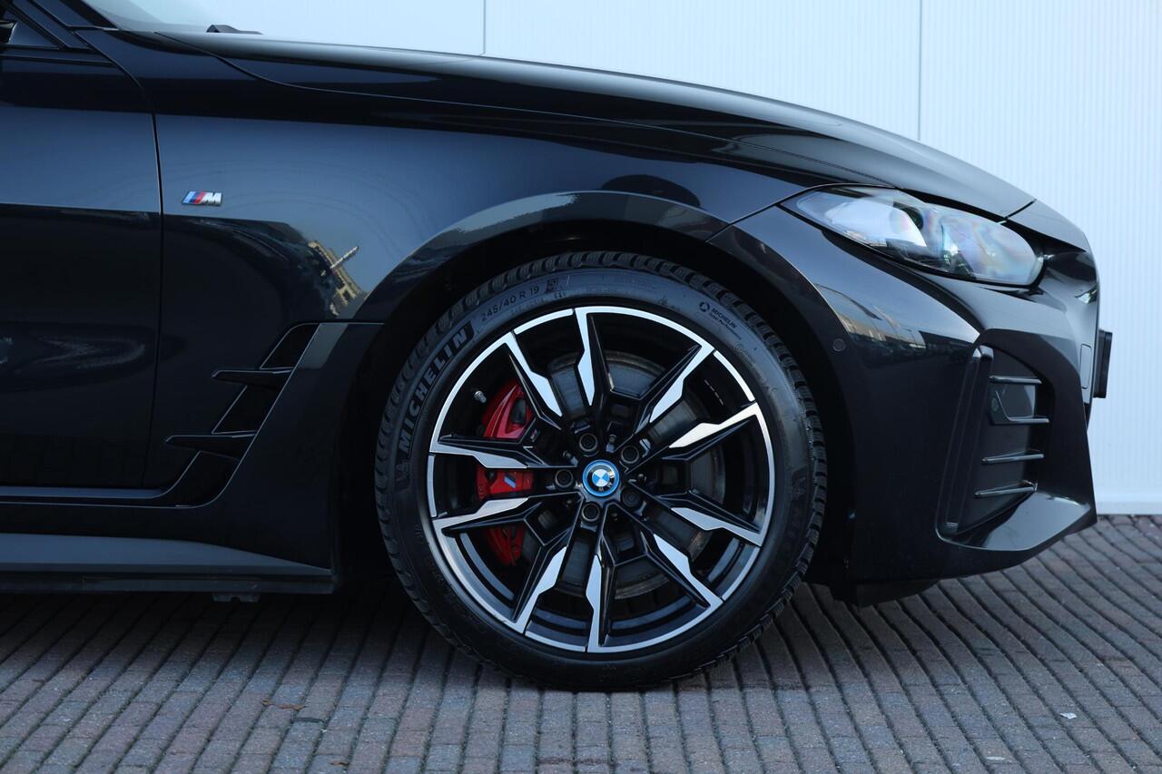 BMW i4 M50 High Executive 84 kWh M Sportpakket Pro/ Verwarmd Stuurwiel/ Comfort Access/ Harman-Kardon/ Driving Assistant Professional/ M Sportstoelen