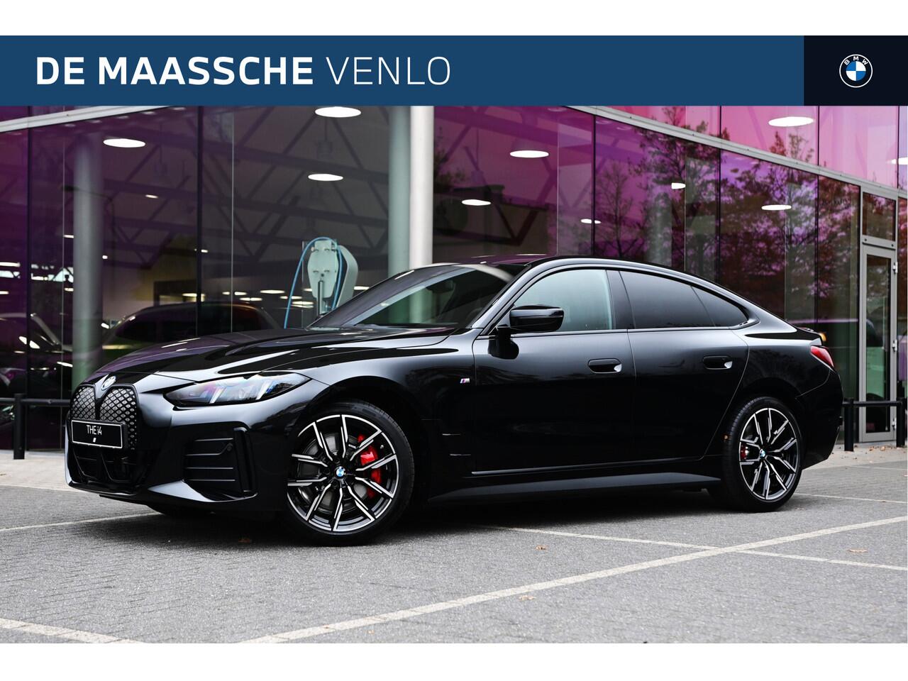 BMW i4 eDrive40 M Sport / Achteruitrijcamera / Adaptieve LED / Active Cruise Control / Live Cockpit Plus / Comfort Access / Stoelverwarming