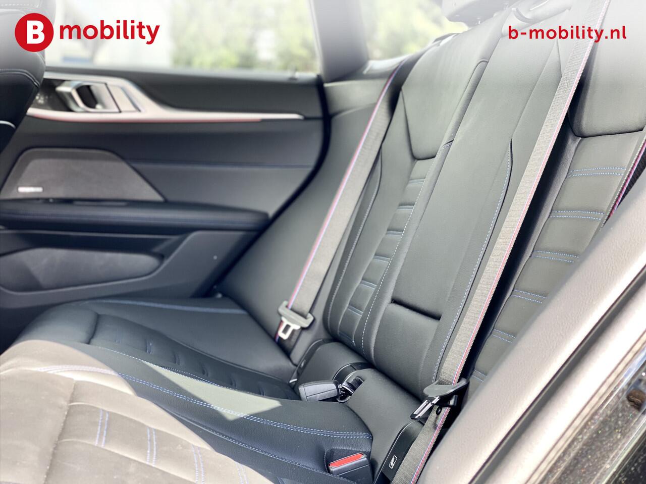 BMW i4 M50 544Pk High Executive 84 kWh Elektrisch verstelbare stoelen | Trekhaak 1600kg | Schuif/Kanteldak | Driving Assistant Professional | Harman Kardon Sound System | Head Up Display | Verwarmbaar stuurwiel | Interieurlijsten Carbon Fibre | Parking Assist.