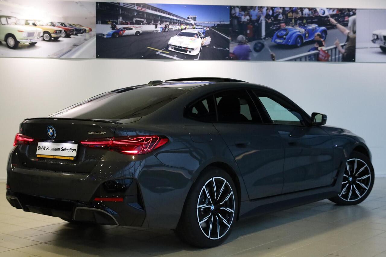 BMW i4 eDrive40 | M Sportpakket Pro | Schuif-kantel dak | Keyless | Active Cruise Control