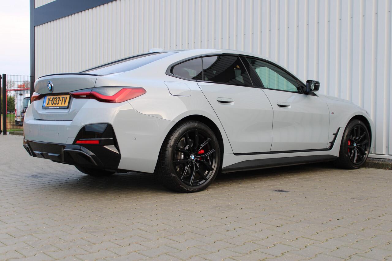 BMW i4 M50 High Executive 84 kWh | Incl. 12 maanden garantie | Assisted driving | Climate control | 360° camera | Uitklapbare trekhaak | Stoel/stuurverwarming | Head-up display | Schuif/kantel dak |