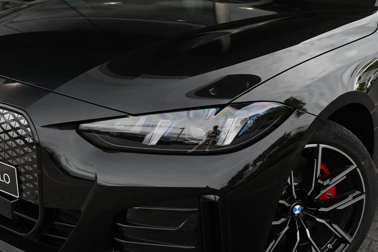BMW i4 eDrive40 M Sport / Achteruitrijcamera / Adaptieve LED / Active Cruise Control / Live Cockpit Plus / Comfort Access / Stoelverwarming