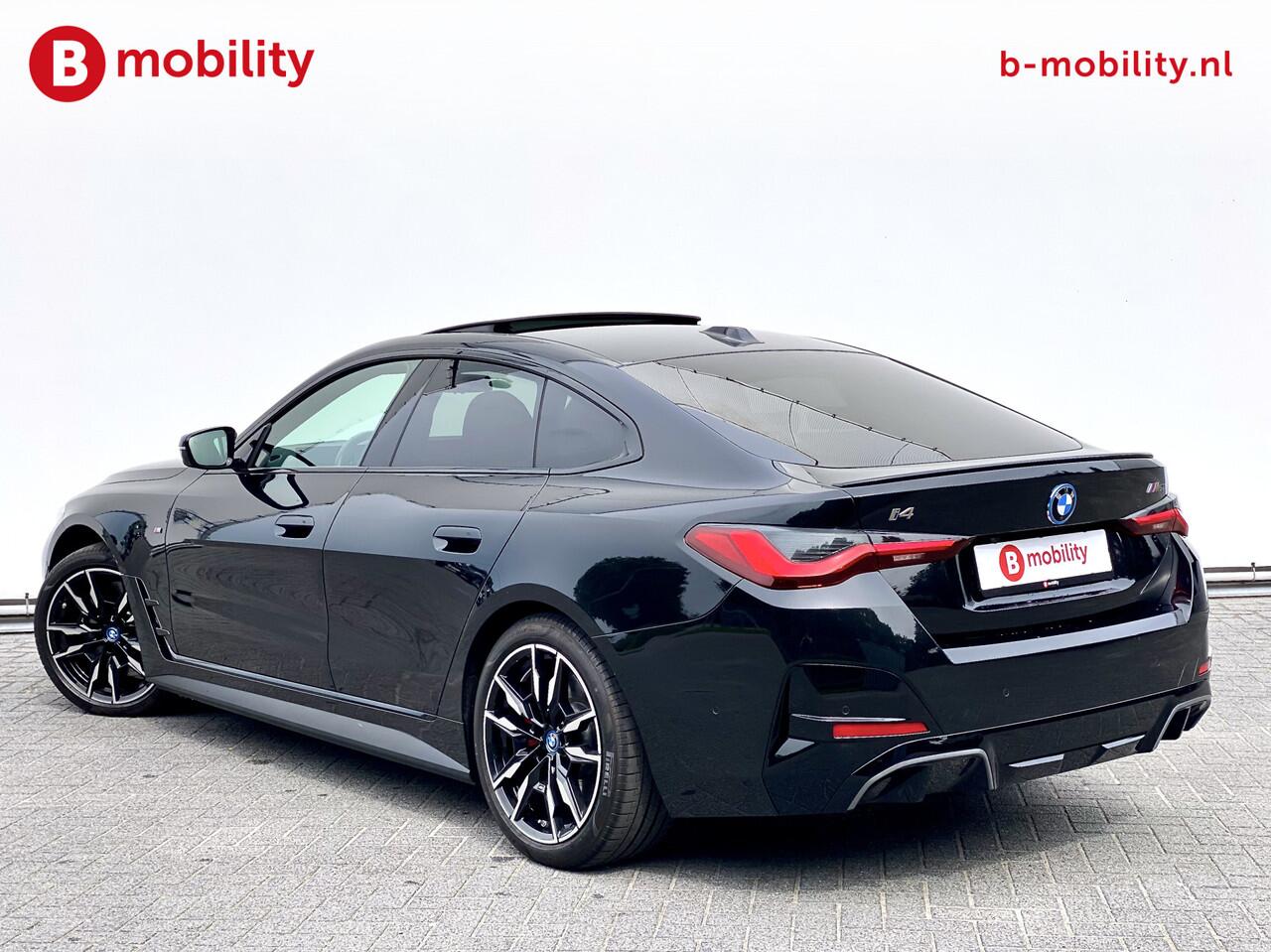 BMW i4 M50 544Pk High Executive 84 kWh Elektrisch verstelbare stoelen | Trekhaak 1600kg | Schuif/Kanteldak | Driving Assistant Professional | Harman Kardon Sound System | Head Up Display | Verwarmbaar stuurwiel | Interieurlijsten Carbon Fibre | Parking Assist.