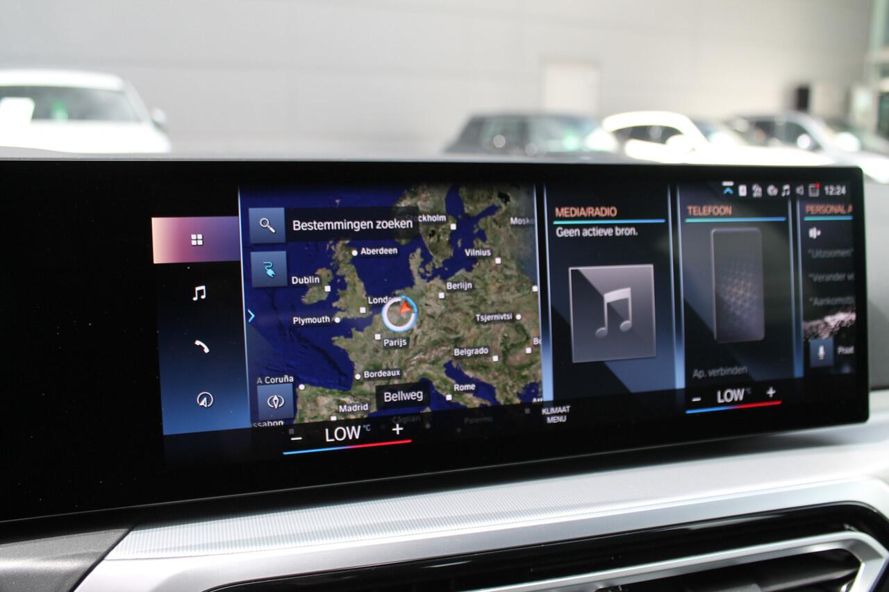 BMW i4 eDrive40 M-Sport / Schuif-kanteldak / Achteruitrijcamera / Live Cockpit Plus / Parking Assistant / Stoelverwarming