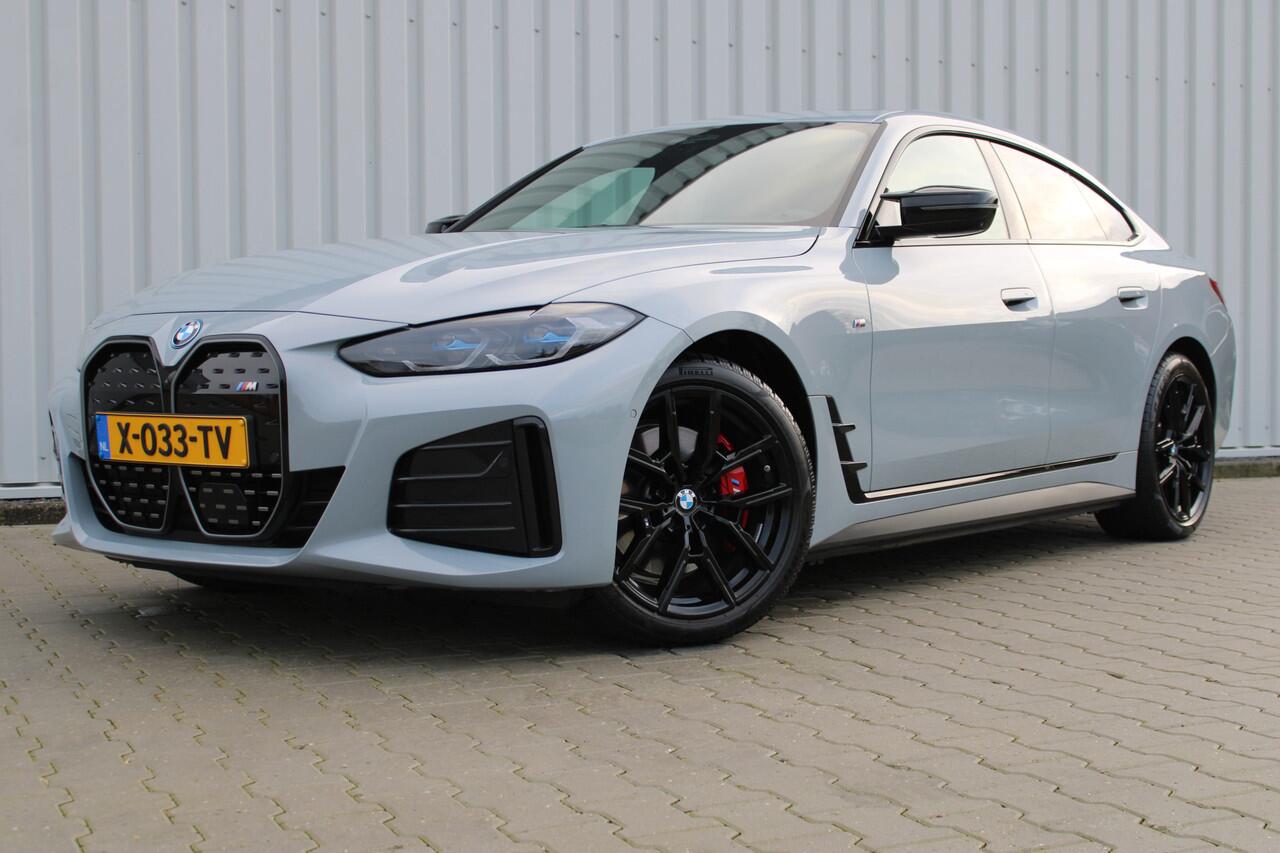 BMW i4 M50 High Executive 84 kWh | Incl. 12 maanden garantie | Assisted driving | Climate control | 360° camera | Uitklapbare trekhaak | Stoel/stuurverwarming | Head-up display | Schuif/kantel dak |