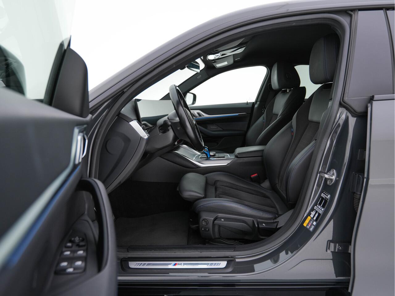 BMW i4 eDrive40 84 kWh M-Sportpack [ 3-Fase ] { SOH-95%} (INCL-BTW) *LEATHER-ALCANTARA | FULL-LED | ADAPTIVE-CRUISE | WIDE-SCREEN-DIGI-COCKPIT | DAB+ | CAMERA | AMBIENT-LIGHT | CARPLAY | SPORT-SEATS | PRIVACY-GLASS | TOWBAR | 18''ALU*