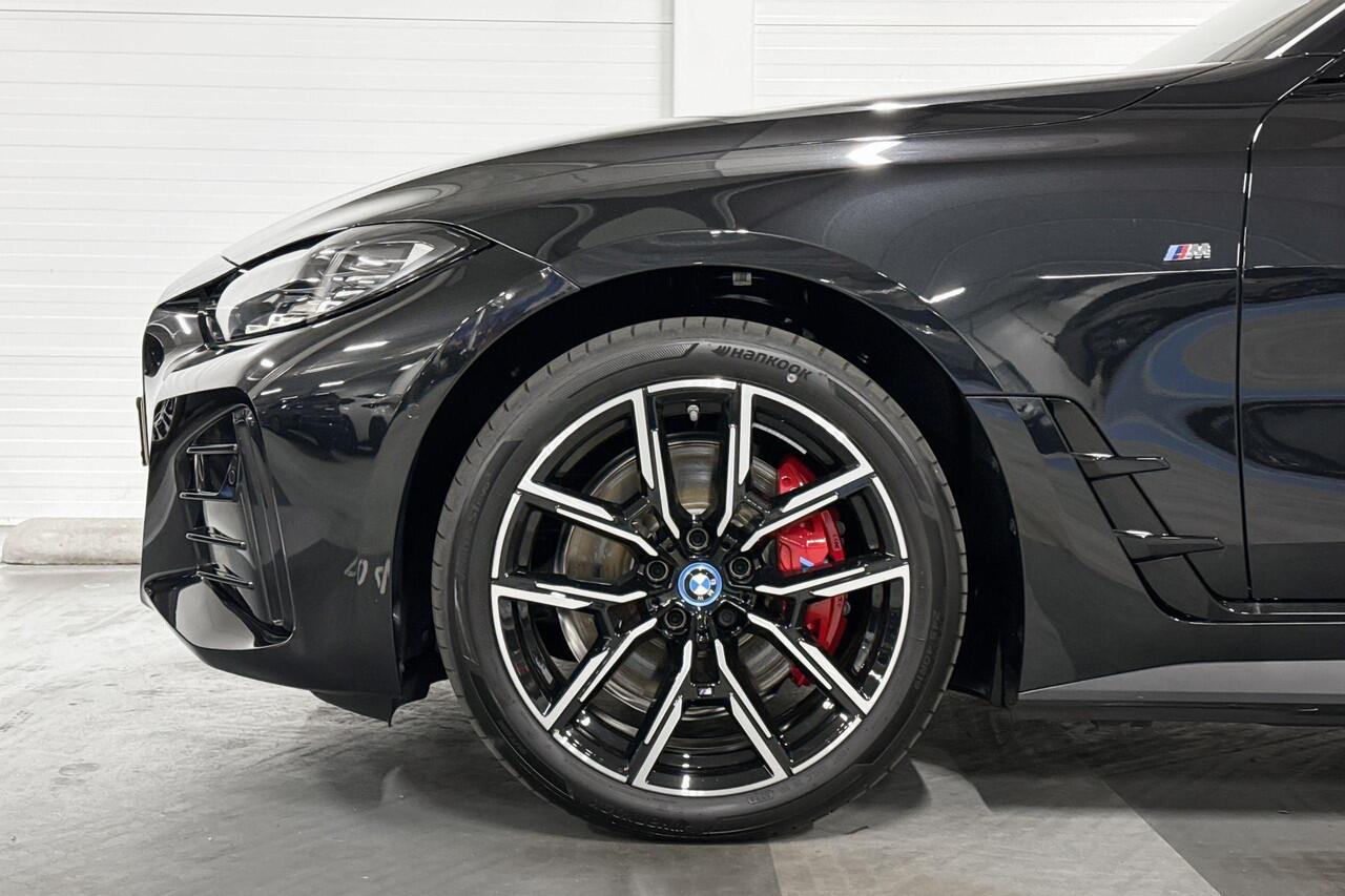 BMW i4 eDrive35 | M-Sport Pro | High Executive | Active Cruise Control | Schuif-/kanteldak | Selections