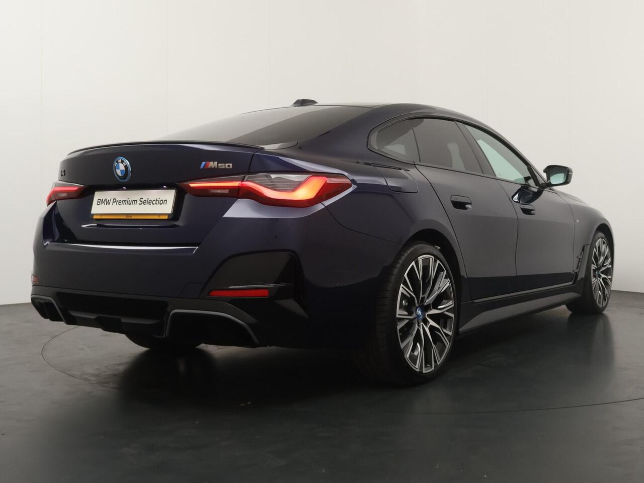 BMW i4 M50 High Executive 84 kWh | Driving Assistant Professional | Trekhaak | Harman Kardon |