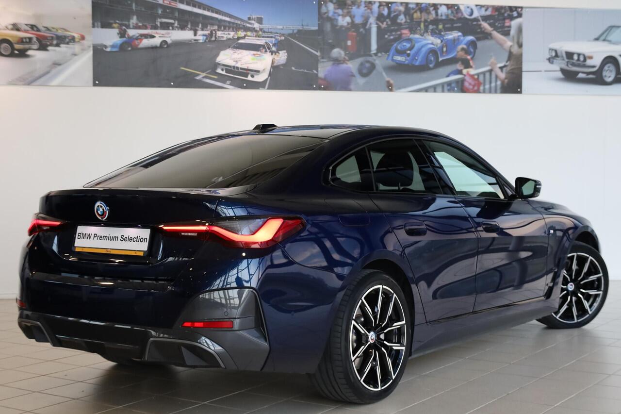 BMW i4 eDrive40 | M Sportpakket | Sportstoelen | Harman-Kardon | Stoelverwarming | Trekhaak