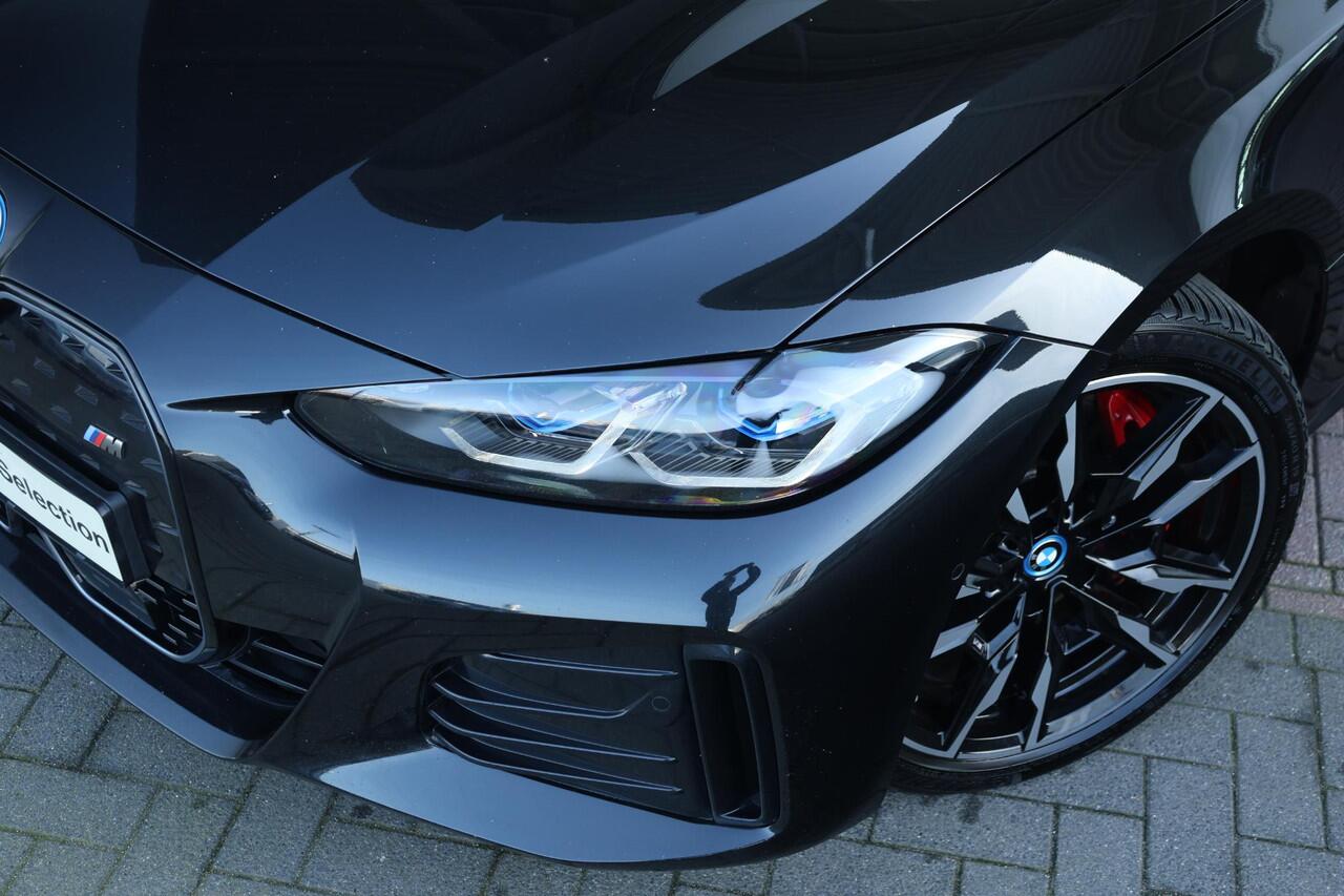 BMW i4 M50 High Executive 84 kWh M Sportpakket Pro/ Verwarmd Stuurwiel/ Comfort Access/ Harman-Kardon/ Driving Assistant Professional/ M Sportstoelen