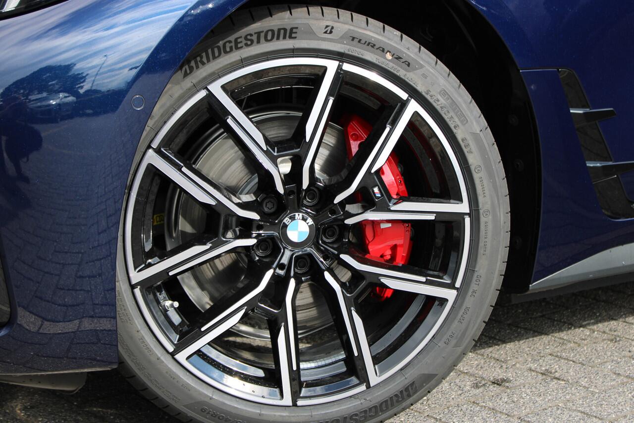 BMW i4 eDrive35 M Sport / Schuif-kanteldak / Achteruitrijcamera / Active Cruise Control / Comfort Access / Adaptieve LED / Stuurverwarming /