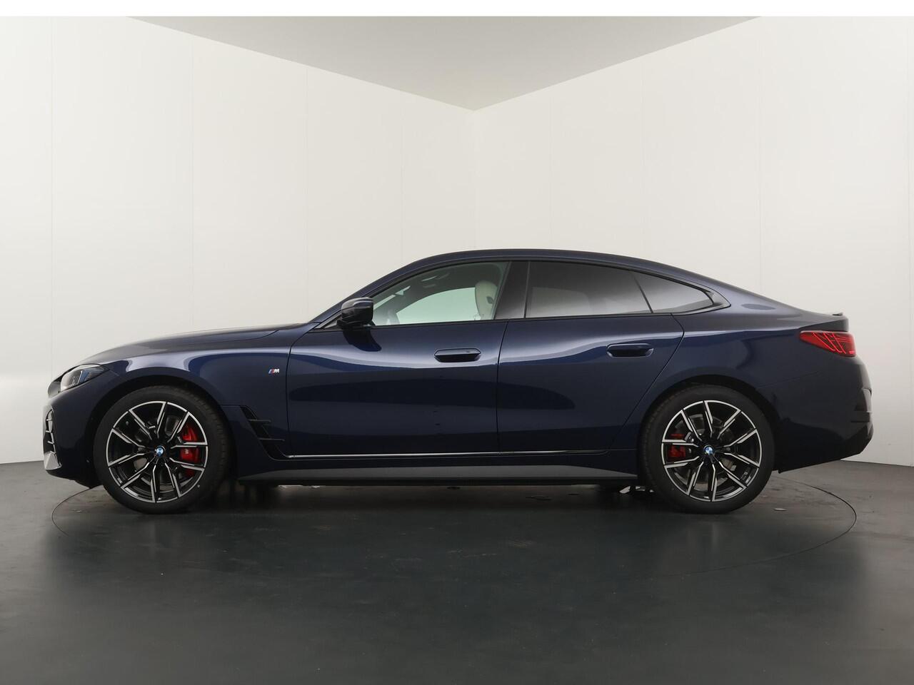 BMW i4 eDrive40 84 kWh M-Sport Pro | Trakhaak | Adaptive Cruise | HiFi | Comfort Access |