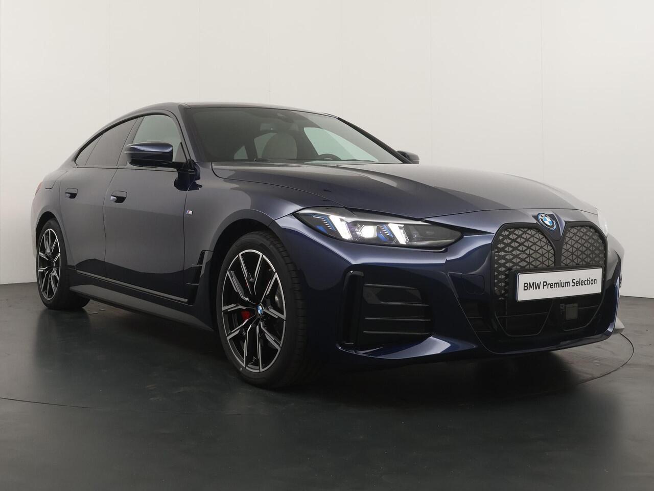 BMW i4 eDrive40 84 kWh M-Sport Pro | Trakhaak | Adaptive Cruise | HiFi | Comfort Access |